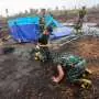 Rains bring relief to Indonesian city weary of fire haze