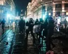 Milan luxury shops close as Italy prepares to deploy troops in the city after days of protests