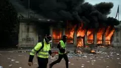 Violent clashes, looting and buildings ablaze as hundreds arrested after France protests