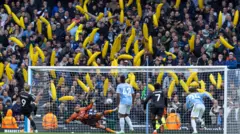 Boos and bananas on day of defiance at Man City