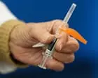 Flu cases rise on west coast earlier than usual as US officials encourage vaccine
