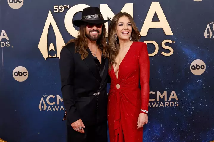 All About Billy Ray Cyrus and Elizabeth Hurley’s Baffling Relationship, Including Their (Possible) Engagement