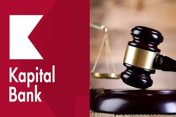 “Kapital Bank”ın əməkdaşı pulu sayarkən 100 manatı qəsdən yerə atırmış 