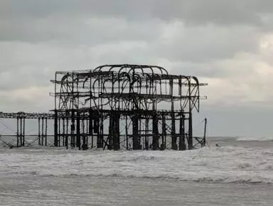 Part of famous Brighton pier collapses as Atlantic storms sweep into England